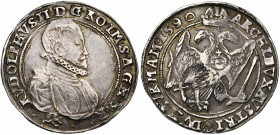 SAINT EMPIRE, Rodolphe II (1576-1612), AR Taler, 1590, Kuttenberg. Pour la Bohême. D/ B. dr. et cuir. à d., une fraise au col. En dessous, petit lion ...