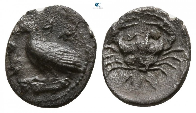 Sicily. Akragas 470-425 BC.
Litra AR

9mm., 0,47g.

Eagle standing left on ...