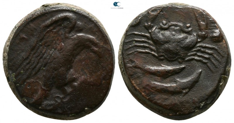 Sicily. Akragas circa 425-410 BC.
Hexas Æ

18mm., 7,88g.

Eagle standing ri...