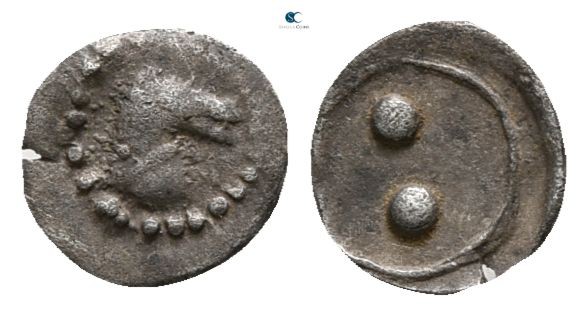 Sicily. Gela circa 480-470 BC.
Dionkion AR

5mm., 0,09g.

Head of horse rig...