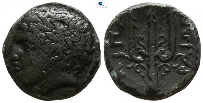 Islands off Sicily. Lipara 289-252 BC.
Bronze Æ

18mm., 7,12g.

Larueate he...