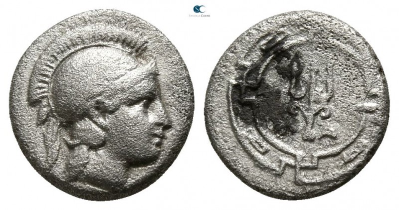 Ionia. Magnesia ad Maeander circa 400-350 BC.
Obol AR

8mm., 0,77g.

Helmet...