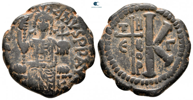 Justinian I AD 527-565. Theoupolis (Antioch)
Half Follis or 20 Nummi Æ

25 mm...