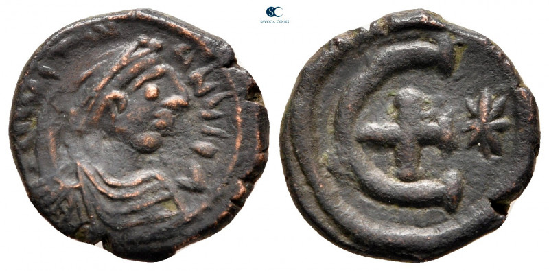 Justinian I AD 527-565. Theoupolis (Antioch)
Pentanummium Æ

16 mm, 2,49 g
...