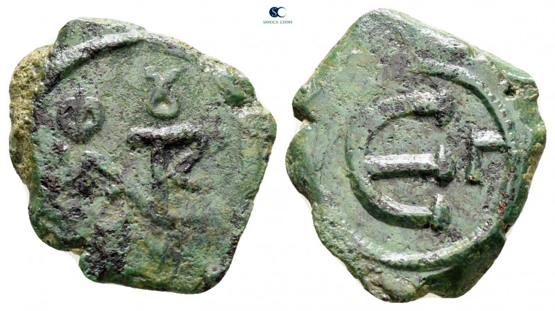 Justin II AD 565-578. Constantinople
Pentanummium Æ

17 mm, 1,91 g



ver...
