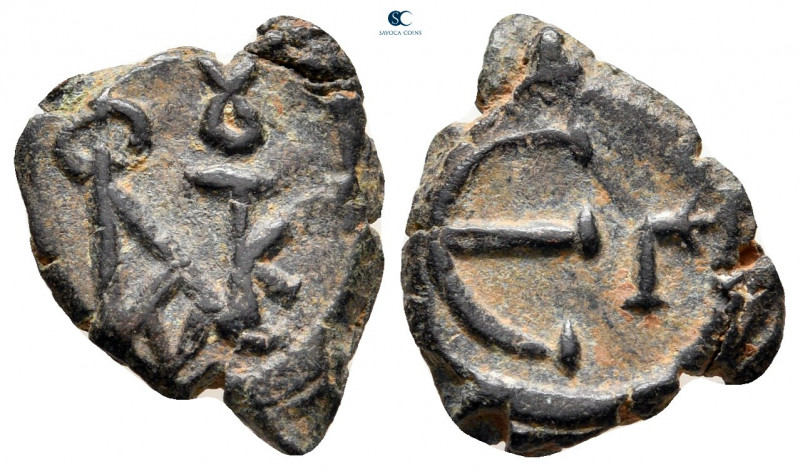 Justin II AD 565-578. Constantinople
Pentanummium Æ

16 mm, 1,80 g



ver...