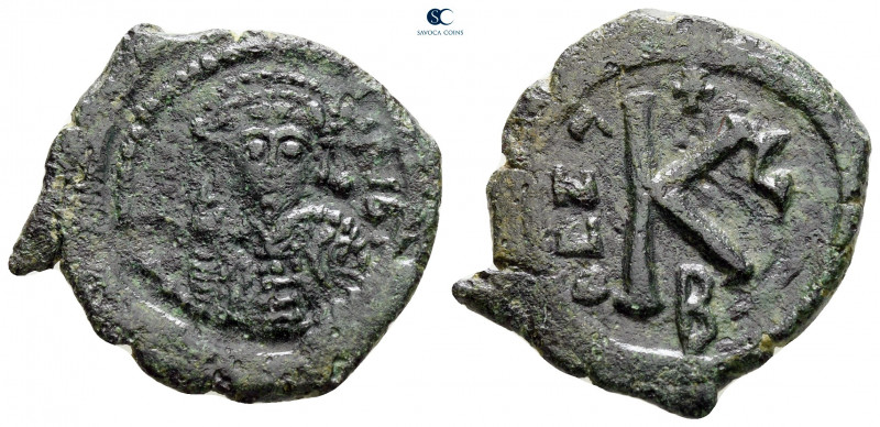 Maurice Tiberius AD 582-602. Uncertain mint
Half Follis or 20 Nummi Æ

26 mm,...