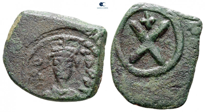 Phocas AD 602-610. Constantinople
Decanummium Æ

21 mm, 2,68 g



nearly ...