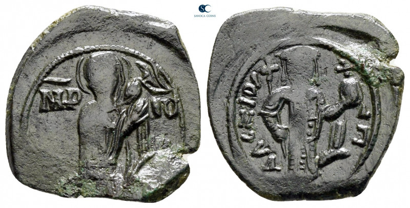 Alexius III Angelus-Comnenus AD 1195-1203. Constantinople
Half Tetarteron Æ

...