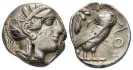 ATTICA. Athens.(Circa 454-404 BC).Tetradrachm.

Obv : Helmeted head of Athena to right.

Rev : AΘE.
Owl standing right, head facing; olive sprig and c...