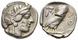 ATTICA. Athens.(Circa 454-404 BC).Tetradrachm.

Obv : Helmeted head of Athena to right.

Rev : AΘE.
Owl standing right, head facing; olive sprig and c...