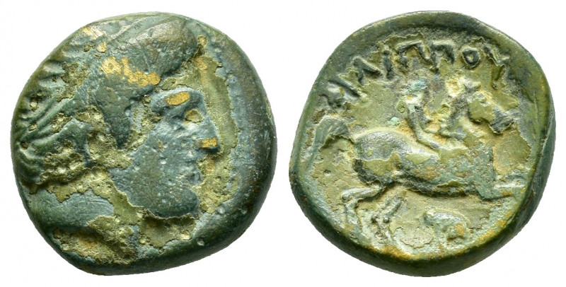 KINGS of MACEDON.Philip III.(323-317 BC).Ae. 

Obv : Diademed head of Apollo to ...