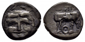 MYSIA.Parion.(4th century BC).Hemidrachm.

Obv : Gorgoneion facing, surrounded by snakes.

Rev : ΠA–PI.
Bull standing left, head right; six-pointed st...