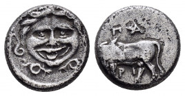 MYSIA.Parion.(4th century BC).Hemidrachm.

Obv : Gorgoneion facing, surrounded by snakes.

Rev : ΠA–PI.
Bull standing left, head right; six-pointed st...