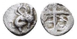 IONIA.Teos.(Circa 500-460 BC).Obol.

Obv : Griffin seated right.

Rev : Quadripartite incuse square.
Balcer 69; Klein 473.

Condition : Somewhat porou...