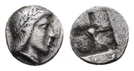 IONIA.Kolophon.(350 BC).Tartemorion.

Obv : Head of Apollo to right.

Rev : Quadripartite incuse square with dot in centre.
Milne 12A; SNG Aulock 7904...