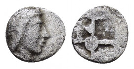 IONIA.Kolophon.(350 BC).Tartemorion.

Obv : Head of Apollo to right.

Rev : Quadripartite incuse square with dot in centre.
Milne 12A; SNG Aulock 7904...