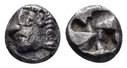 IONIA.Kolophon.(Circa late 6th Century BC).Tetartemorion.

Obv : Archaic head of Apollo to left.

Rev : Irregular incuse punch.
Klein 356.

Condition ...