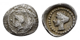 DYNASTS of LYCIA.Uncertain.(Circa 400 BC).Obol.

Obv : Head of Athena to right, wearing decorated Attic crested helmet of Athenian style.

Rev : Head ...