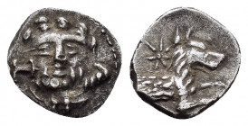 LYCAONIA.Laranda.(Circa 324-323 BC).Obol.

Obv : Facing head of Herakles, with club; H to left.

Rev : Forepart of wolf to right; star above. 
Gokturk...