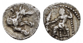 LYCAONIA.Laranda.(Circa 324-323 BC).Obol.

Obv : Baaltars seated left, holding grain ear, bunch of grapes, and scepter.

Rev : Forepart of wolf right;...