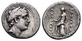 SELEUKID KINGS of SYRIA.Seleukos IV.(187-175 BC).Soli.Drachm . 

Obv : Diademed head of Antiochos III right. 

Rev : Apollo seated left on omphalos, h...