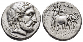 SELEUKID KINGDOM.Seleukos I.(312-281 BC).Seleuceia II.Tetradrachm. 

Obv : Laureate head of Zeus to right.

Rev : ΒΑΣΙΛΕΩΣ ΣΕΛΕΥΚΟΥ.
Athena in quadrig...