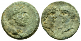 ASIA MINOR.Uncertain. Vespasian with Titus and Domitian.(69-79).Ae.

Obv : ....ΟΥΕϹΡΑ-ϹΙΑ...
Baureate head.

Rev : ΤΙΤΟϹ ΚΑΙ ΔΟ...
Bare heads of...