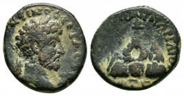 CAPPADOCIA, Caesarea. Marcus Aurelius. (161-180). Ae.

Obv : ΑΥΤΟΚΡ ΑΝΤⲰΝƐΙΝΟϹ ϹƐΒΑϹΤOC.
Laureate head of Marcus Aurelius, right.

Rev : ΚΑΙϹΑΡƐⲰΝ Τ Π...