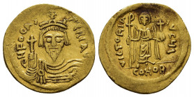 PHOCAS.(602-610). Constantinople.Solidus.

Obv : δ N FOCAS PЄRP AVG.
Crowned and cuirassed facing bust, holding globus cruciger.

Rev : VICTORIA AVGЧ ...