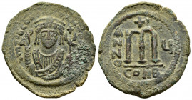 TIBERIUS II CONSTANTINE.(578-582).Constantinople.Follis.

Obv : d m TIb CONSTANT P P AVI.
Crowned facing bust, wearing consular robes and holding mapp...