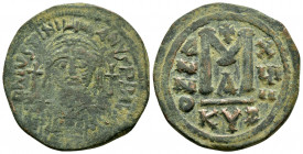 JUSTINIAN I (527-565). Follis. Cyzicus. Dated RY 18 (544/5).

Obv : D N IVSTINIANVS P P AVG.
Helmeted and cuirassed bust facing, holding globus crucig...