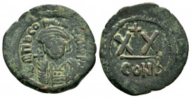 TIBERIUS II CONSTANTINE.(578-582).Constantinople.Half Follis.

Obv : DM TIB CONTANT PP AV.
Crowned and cuirassed bust facing, holding cross on globe a...