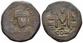 MAURICE TIBERIUS.(582-602).Constantinople.Ae.

Obv : D N MAVRC TIbЄR P P AVG.
Helmeted and cuirassed facing bust of Maurice Tiberius, holding globus c...
