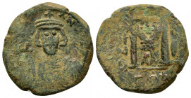 JUSTINIAN II.(First reign 685-695).Constantinople.Follis.

Obv : IVSTINIANVS P.
Crowned bust facing, short beard, wearing chlamys, holding cross on...