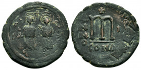 PHOCAS.(602-610).Constantinople.Follis.

Obv : δ M FOCAЄ P P AЧ.
Phocas, holding globus cruciger, and Leontia, holding cruciform scepter, standing fac...