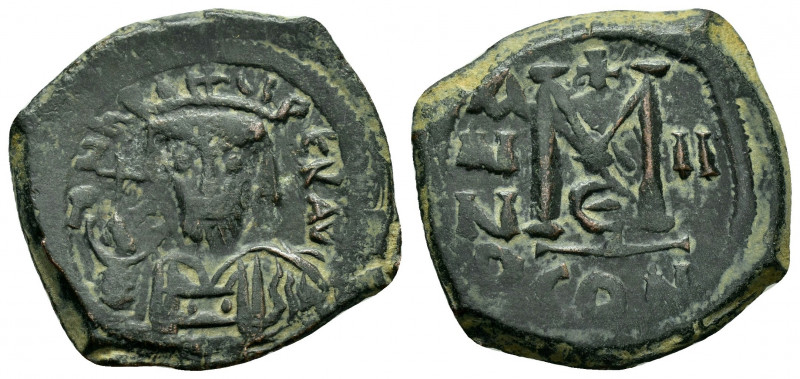 HERACLIUS.(610-641).Constantinople.Follis . 

Obv : dN hRACLIVS PeRP AVG.
Crowne...
