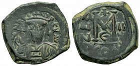 HERACLIUS.(610-641).Constantinople.Follis . 

Obv : dN hRACLIVS PeRP AVG.
Crowned and cuirassed or plumed-helmeted and cuirassed bust facing, bearded,...