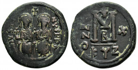 JUSTIN II and SOPHIA.(565-578).Cyzicus.Follis.

Obv : D N IVSTI NVS PP AV.
Justin and his wife Sophia, both nimbate, seated facing on throne: the Empe...