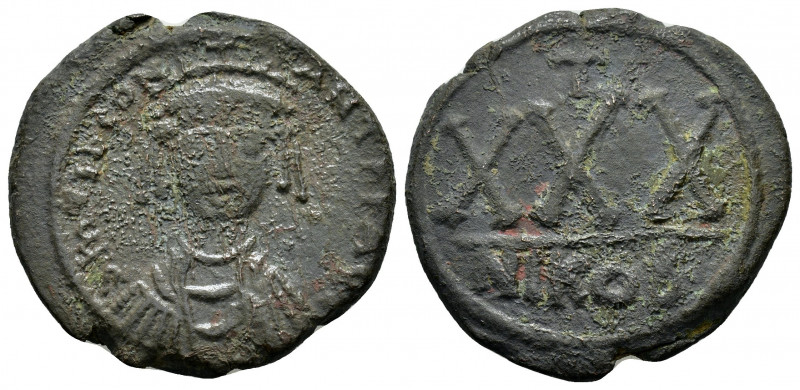 TIBERIUS II CONSTANTINE.(578-582).Nicomedia.Follis.

Obv : uM'TIbCONS TANTPPAVC....