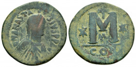 ANASTASIUS I.(491-518).Constantinople.Follis. 

Obv : DN ANASTASIVS PP AVG.
Pearl diademed, draped, cuirassed bust right.

Rev : Large M, star left, c...
