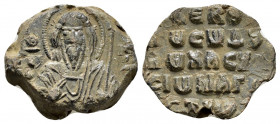 Byzantine lead seal of Basileios magistros.(11th cent.)

Obverse: Facial bust of saint John the Baptist, nimbate, with long hair and bearded, wearing ...