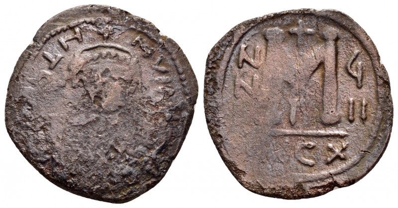 ARAB-BYZANTINE.Follis.


Condition : Very fine.

Weight : 9.6 gr
Diameter : 27 m...