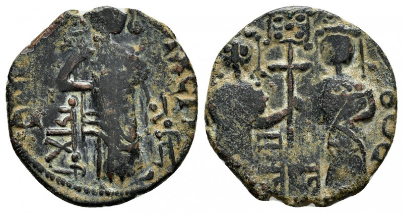 ZANGIDS of SYRIA.Nur al-Din Mahmud.(1146-1174).Fals.

Obv : Two standing Byzanti...