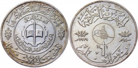Iraq 1 Dinar 1979 AH1400
Silver; medallic issue; Science Day - The National Comprehensive Campaign for Compulsory Illiteracy Eradication, the Supreme...