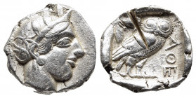 ATTICA. Athens. Tetradrachm (Circa 454-404 BC).
Obv: Helmeted head of Athena right, with frontal eye.
Rev: AΘE. Owl standing right, head facing; olive...