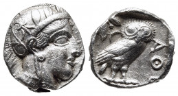 ATTICA. Athens. Tetradrachm (Circa 454-404 BC).
Obv: Helmeted head of Athena right, with frontal eye.
Rev: AΘE. Owl standing right, head facing; olive...