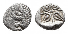SATRAPS OF CARIA. Hekatomnos, circa 392/1-377/6 BC. Obol.
Obv: Head and front leg of a roaring lion to left. 
Rev. Stellate pattern within square incu...