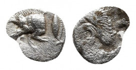 Mysia, Kyzikos AR Hemiobol. Circa 450-400 BC. 
Obv: Forepart of boar to left, tunny fish behind.
Rev: Head of roaring lion to left; star to upper left...