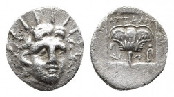 Islands off Caria, Attalos Magistrate. Hemidrachm or diobol, circa 170-150 BC. 
Obv: Radiate head of Helios facing slightly right.
Obv: Rose with bud ...